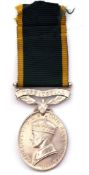 Efficiency Medal, George VI, with Territorial bar impressed to 2815936 Pte D Sutherland 4-5
