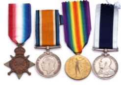 WWI and later group of four comprising 1914-15 Star, British War Medal, Victory Medal and Royal