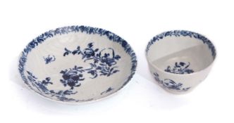 Worcester feather moulded tea bowl and saucer with a blue and white floral design with workman's