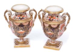 Pair of 19th century Derby (King Street) vases richly decorated in Imari style with gilt scroll