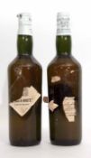 Black and White blended whisky, James Buchanan & Son, Glasgow, 2 bottles (traces of labels remaining