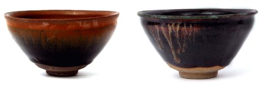 Two Japanese pottery bowls decorated with Tenmoku type glazes, one bowl complete with wooden box