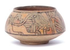 Indus Valley pottery bowl possibly circa 2000BC with painted decoration of a lion and a bull, 8cm