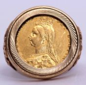 Victorian gold half sovereign shield back, dated 1887, in a 9ct gold ring mount, the shoulders