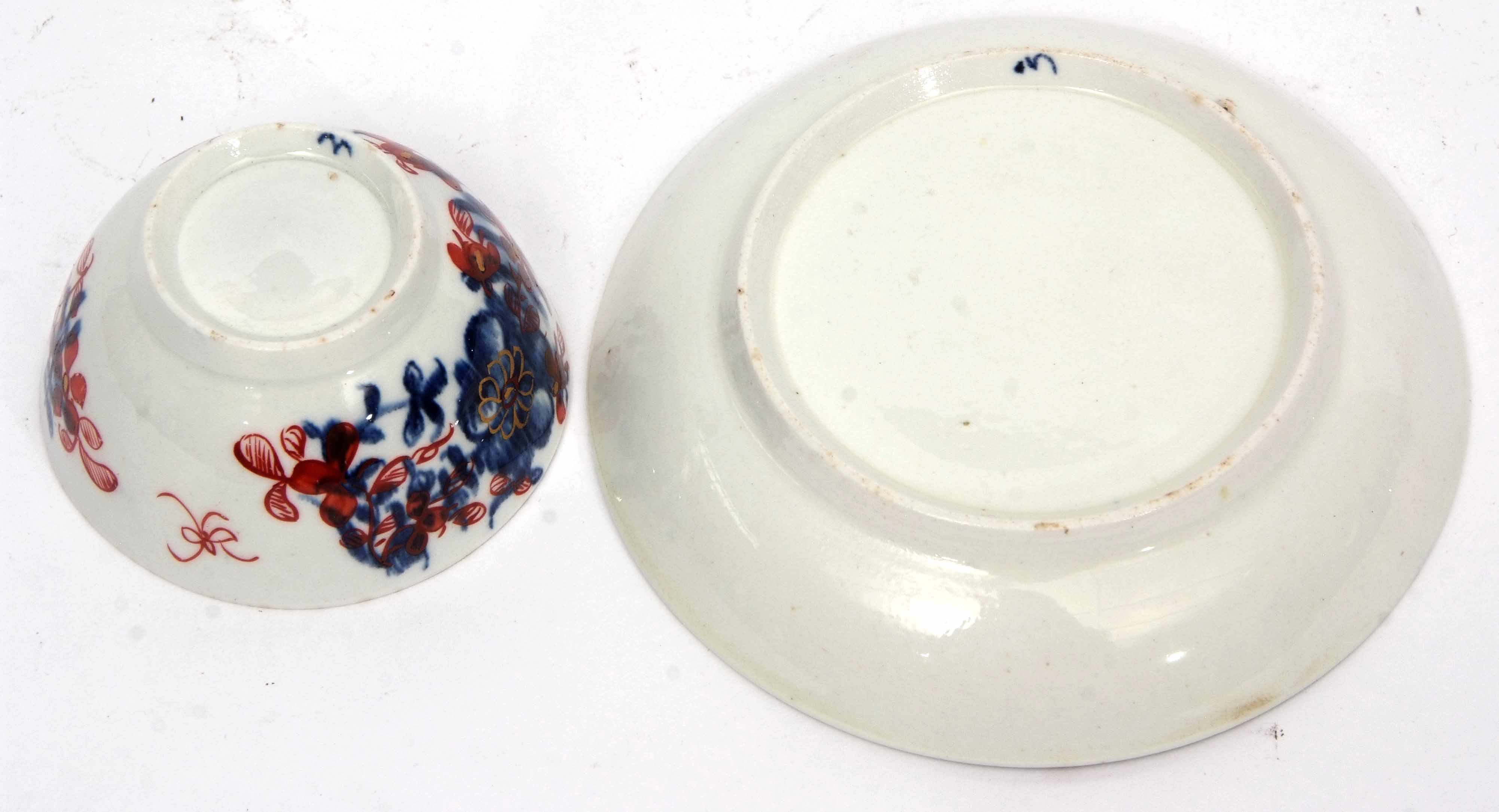 Lowestoft porcelain tea bowl and saucer circa 1780, the blue and white design clobbered with a - Image 3 of 4