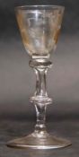 Wine glass with Jacobite style engraving of a rose raised on a double knopped stem, 14cm high