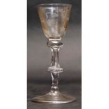 Wine glass with Jacobite style engraving of a rose raised on a double knopped stem, 14cm high