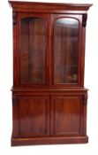 Victorian mahogany bookcase cabinet, moulded corners over two glazed doors enclosing fitted