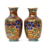 Pair of Japanese cloisonne vases, finely decorated with enamels of flowers on a rich gilt ground,