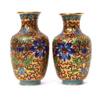 Pair of Japanese cloisonne vases, finely decorated with enamels of flowers on a rich gilt ground,