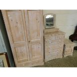 WASHED PINE FOUR PIECE BEDROOM SUITE COMPRISING A DOUBLE DOOR WARDROBE, A TWO OVER FOUR FULL WIDTH