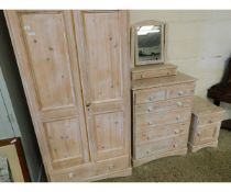 WASHED PINE FOUR PIECE BEDROOM SUITE COMPRISING A DOUBLE DOOR WARDROBE, A TWO OVER FOUR FULL WIDTH
