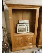 GOOD QUALITY MODERN OAK BOOKCASE WITH ADJUSTABLE SHELVES OVER TWO PANELLED CUPBOARD DOORS