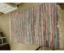 GOOD QUALITY MULTI-COLOURED RUSTIC CARPET WITH TASSELLED EDGE