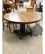 MAHOGANY SEGMENTED TOP CIRCULAR CENTRE TABLE WITH CANTED COLUMN ON A QUATREFOIL BASE