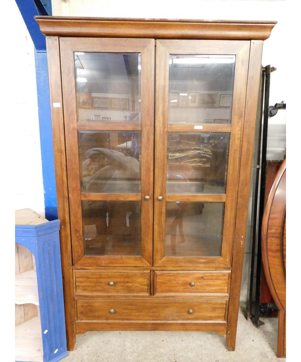 GOOD QUALITY BEECHWOOD FRAMED BOOKCASE WITH TWO DOORS WITH GLASS SHELVES OVER TWO DRAWERS WITH