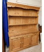 LARGE PINE DRESSER WITH THREE CUPBOARD DOORS