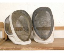 TWO FENCING MASKS