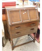 OAK FRAMED BUREAU WITH DROP FRONT AND TWO FULL WIDTH DRAWERS ON TURNED STAND