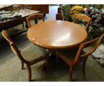 BEECHWOOD FRAMED CIRCULAR EXTENDING KITCHEN TABLE TOGETHER WITH A MATCHING SET OF FOUR BAR BACK