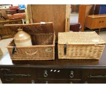 TWO WICKER HAMPERS TOGETHER WITH A FURTHER FLAGON (3)