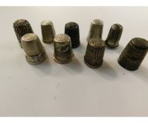 NINE ASSORTED SILVER THIMBLES