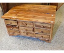 EASTERN HARDWOOD COFFEE TABLE WITH NINE DRAWERS WITH KNOB HANDLES