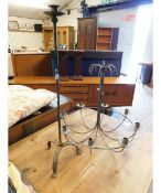 CAST IRON SINGLE CANDLE STAND, TOGETHER WITH A METAL CANDLE STAND (2)