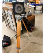 GOOD QUALITY STAGE LIGHT MOUNTED ON A FOLDING THEODOLITE STAND