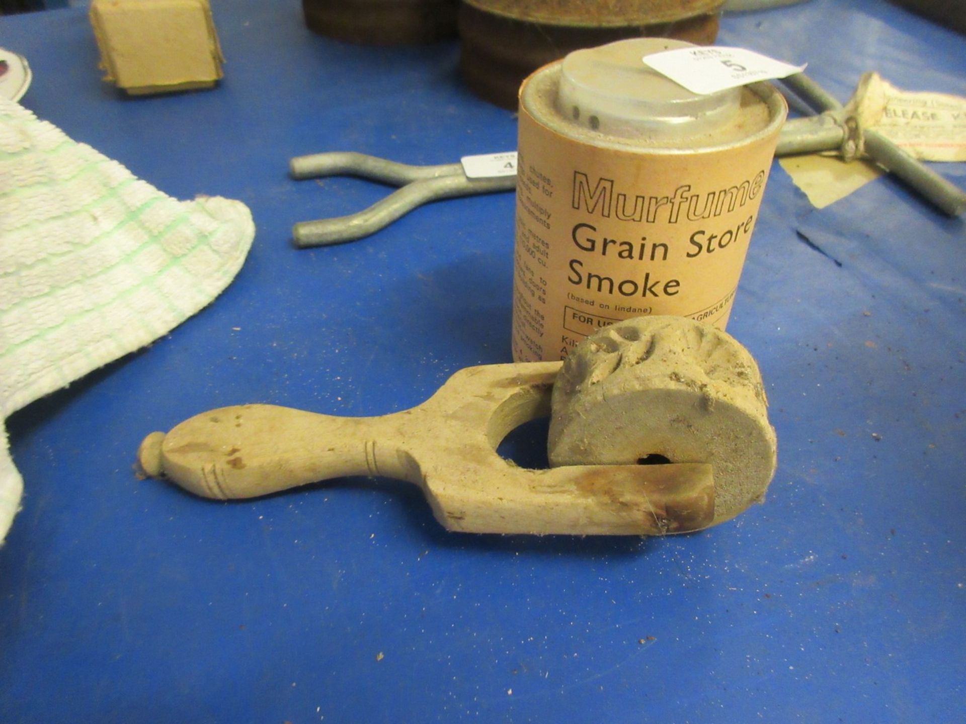 Vintage pastry cutter together with grain store smoke capsule