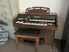 Circa 1960s/1970s Hammond organ with drawbars and brite foot pedalboard