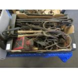 Box containing various vintage hooks, blacksmiths tools, drills, etc