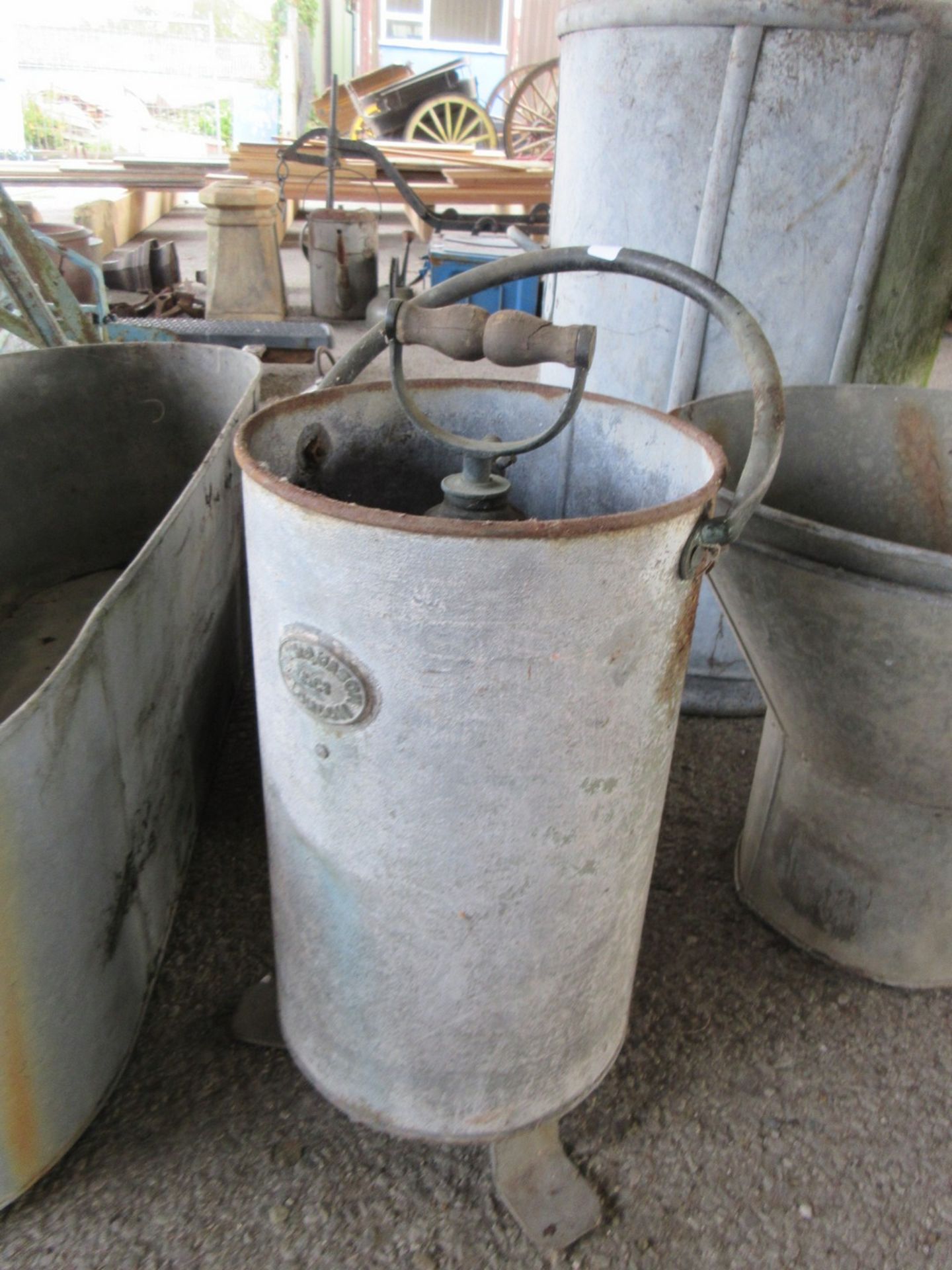 Shand Mason and company fire bucket with stirrup pump