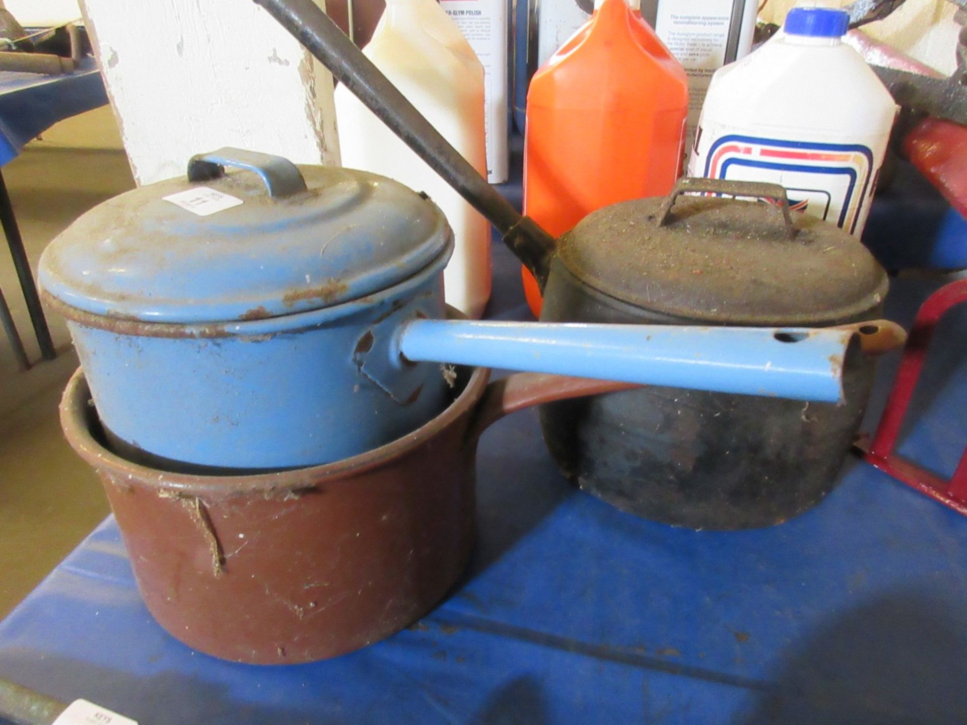 Three various vintage saucepans