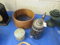A wooden sieve together with a small pot and a silverplated teapot