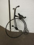 An unusual Childs size penny Farthing, or standard bicycle