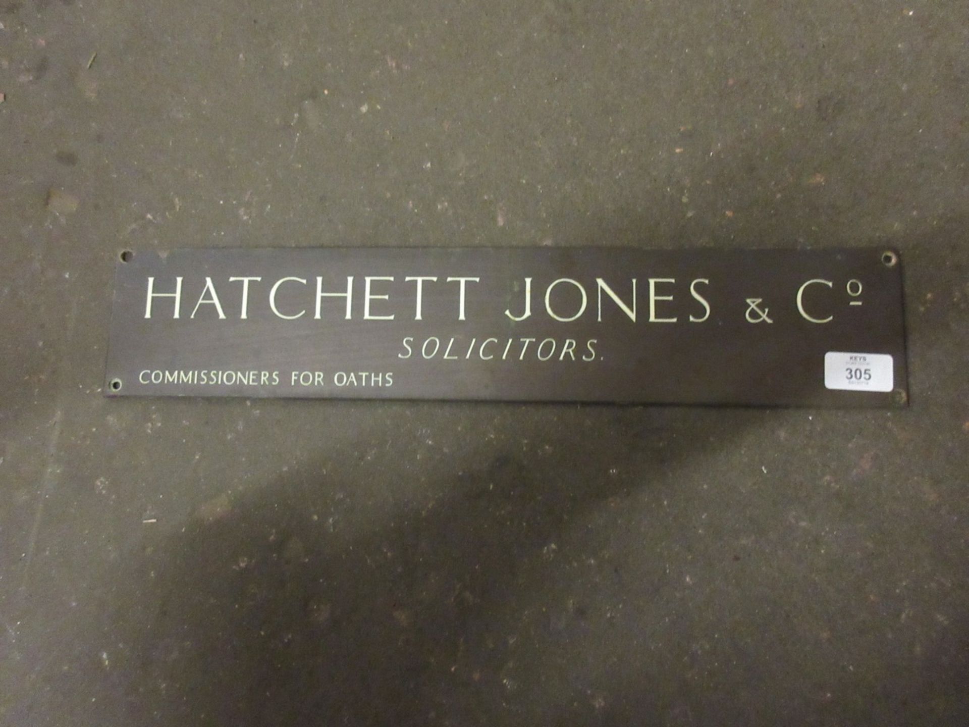 Local interest metal door plate, for Hatchett Jones and co, solicitors