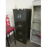 Vintage metal filing cabinet with key