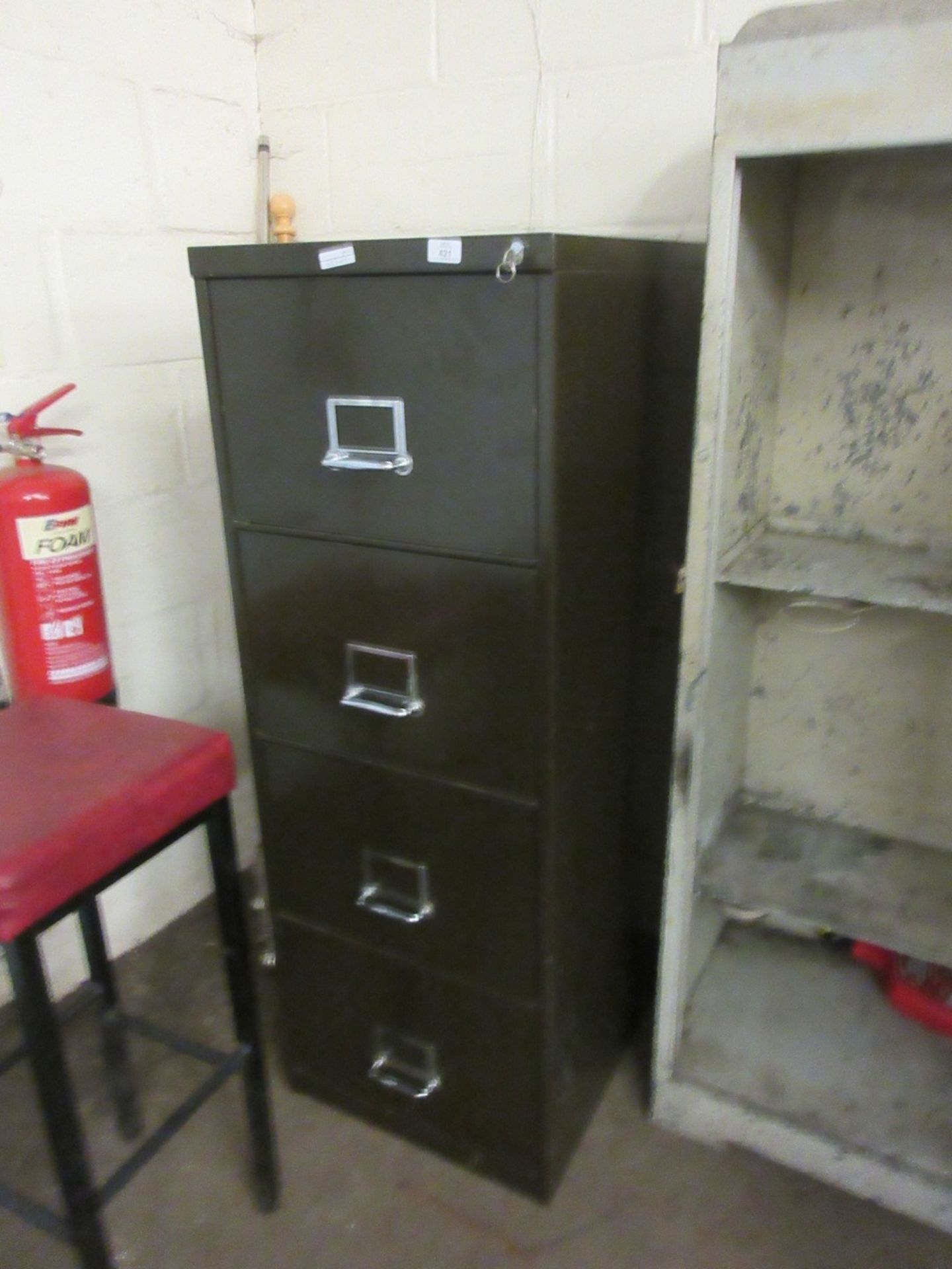 Vintage metal filing cabinet with key
