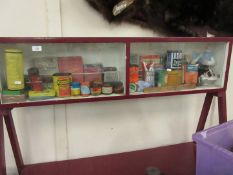 A fine and wide ranging collection of vintage packaging contained within a glazed display case,