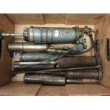 Box containing various grease guns etc