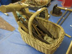 Basket containing quantity of various wooden handled vintage tools