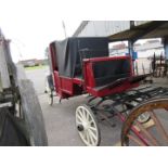 Vintage covered horse-drawn Carriage, fully restored and in recent use as a weddding hire vehicle.