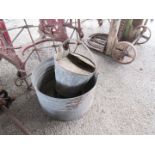 Large metal pot together with a Dairy bucket