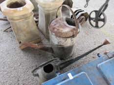 Two metal watering cans