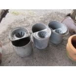 Three galvanised mop buckets