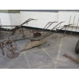 Vintage Ransomes horse plough, t/w some spares, seed drill box, etc