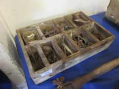 Wooden tray and contents including various old ironmongery etc