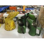 Five various oil jugs