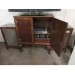 Dynatron music centre model HFC101A circa 1960s/70s, Fitted in reproduction wooden cabinet with